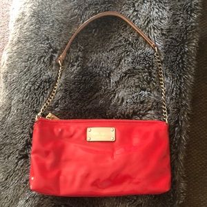 Kate Spade New York Red Patent Leather clutch.